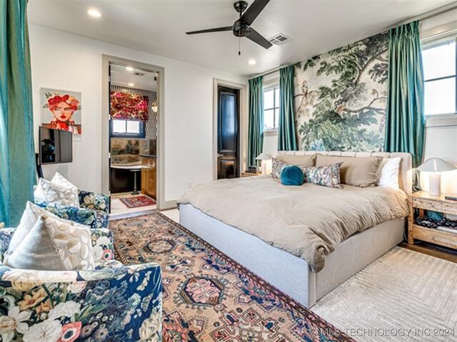 bedroom with a ceiling fan, multiple windows, visible vents, and recessed lighting