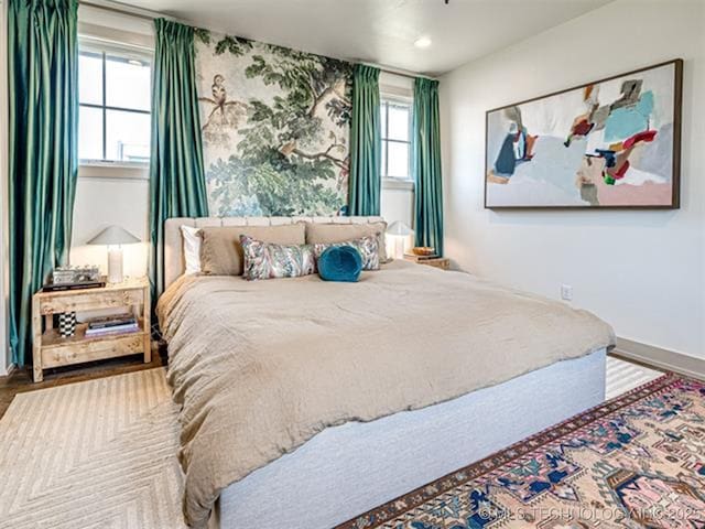 46 Redbud St, Carlton Landing, OK 74432 - bedroom featuring multiple windows, baseboards, recessed lighting, and wood finished floors