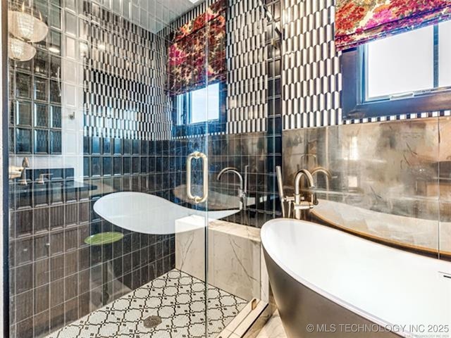 46 Redbud St, Carlton Landing, OK 74432 - full bath featuring tile walls, a soaking tub, and a stall shower