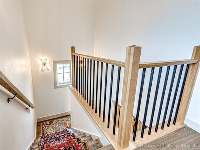 46 Redbud St, Carlton Landing, OK 74432 - stairway with wood finished floors and baseboards