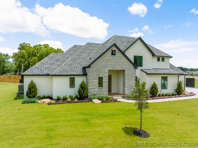 view of front of home with a front yard