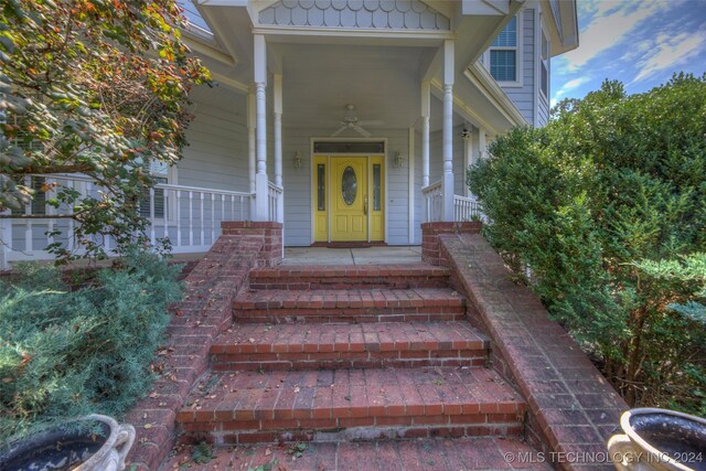 doorway to property with a porch