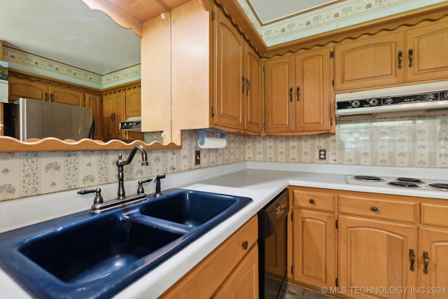 kitchen with stainless steel refrigerator, dishwasher, white electric cooktop, and sink