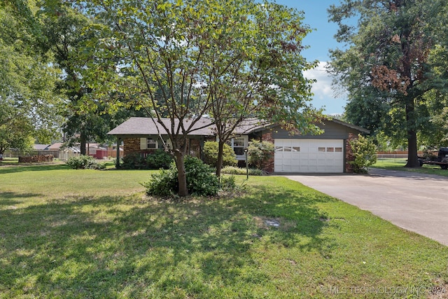 single story home with a garage and a front lawn