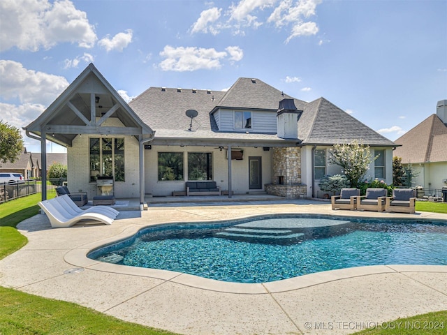 view of pool featuring an outdoor hangout area and a patio area