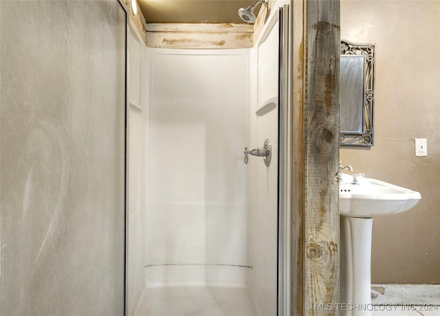 full bath with a shower stall