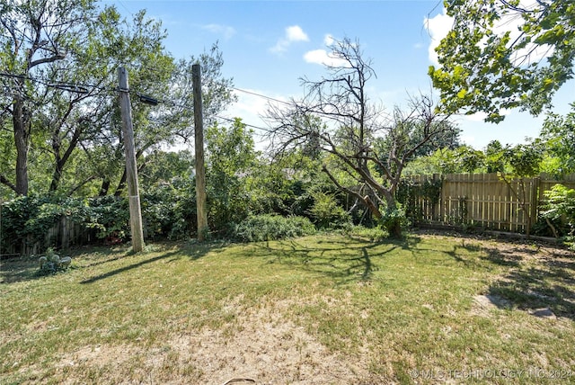 view of yard with fence