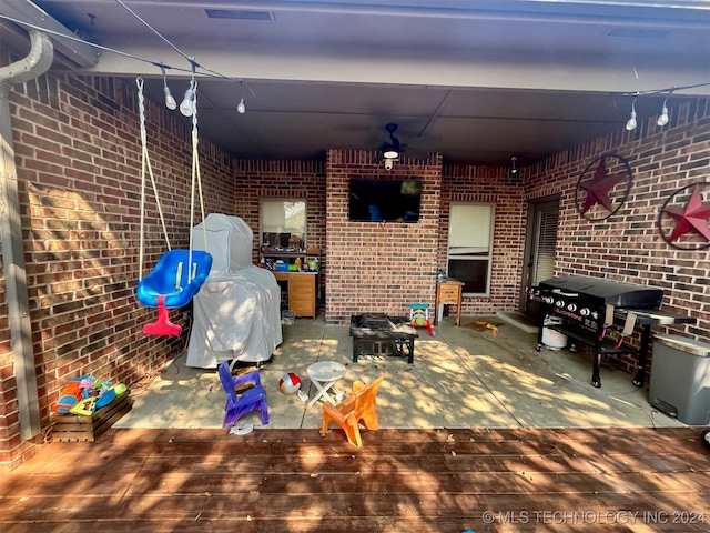 view of patio featuring a fire pit