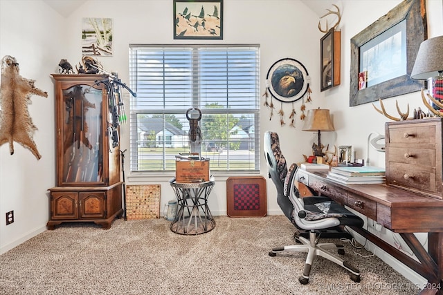 office area with carpet, vaulted ceiling, and plenty of natural light