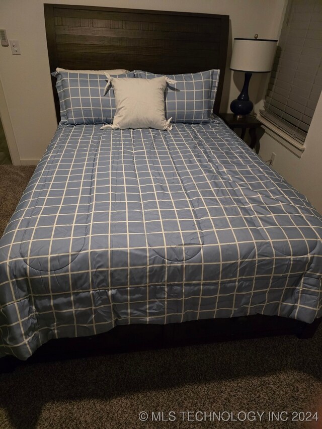 unfurnished bedroom featuring carpet floors