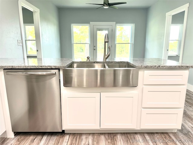 kitchen featuring dishwasher, ceiling fan, light hardwood / wood-style flooring, and white cabinets