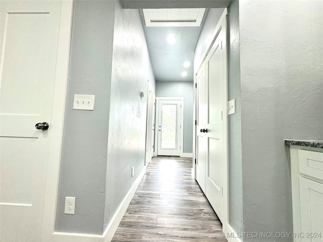 hall featuring hardwood / wood-style floors