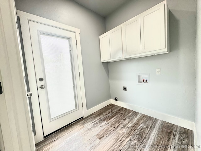 laundry room featuring washer hookup, light hardwood / wood-style flooring, cabinets, and electric dryer hookup