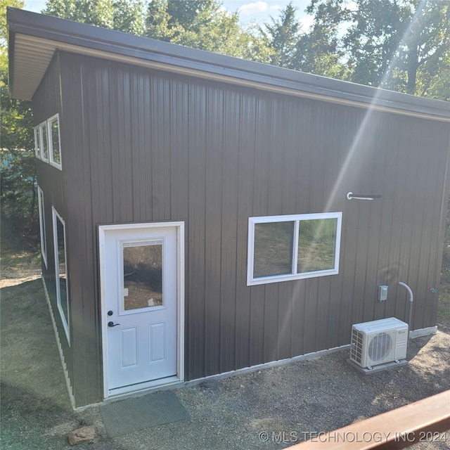 exterior space with ac unit