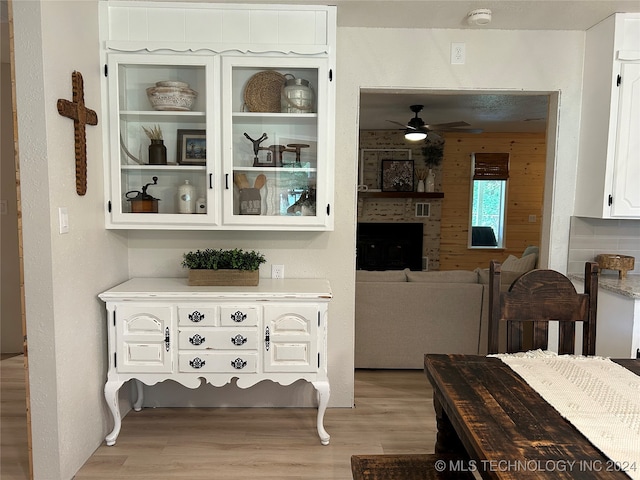 dining room featuring ceiling fan and light hardwood / wood-style flooring