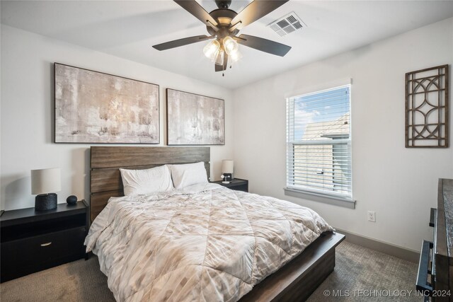 carpeted bedroom featuring ceiling fan