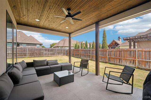 view of patio with ceiling fan and an outdoor hangout area