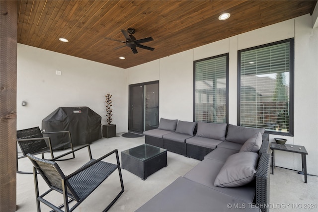 view of patio with a grill, ceiling fan, and outdoor lounge area