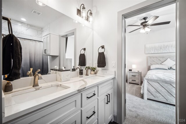 bathroom with vanity and ceiling fan