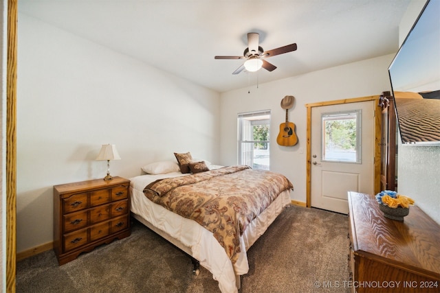 bedroom featuring ceiling fan and carpet floors