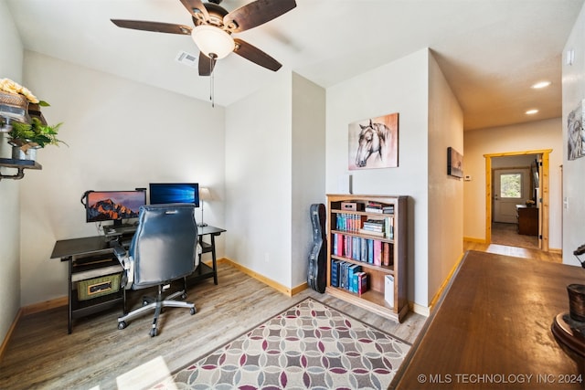 office area featuring ceiling fan and light hardwood / wood-style floors