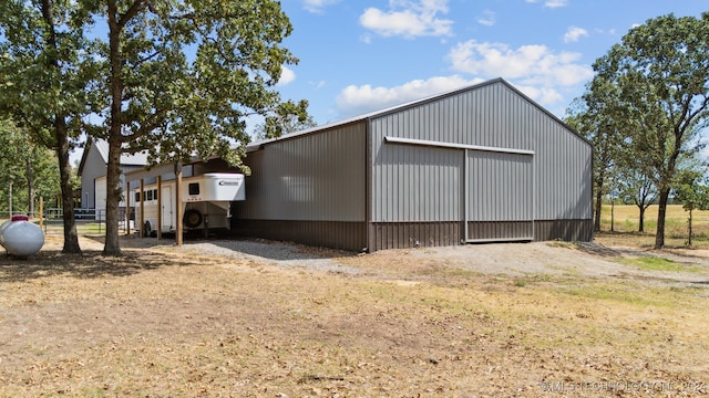 view of outbuilding featuring a garage