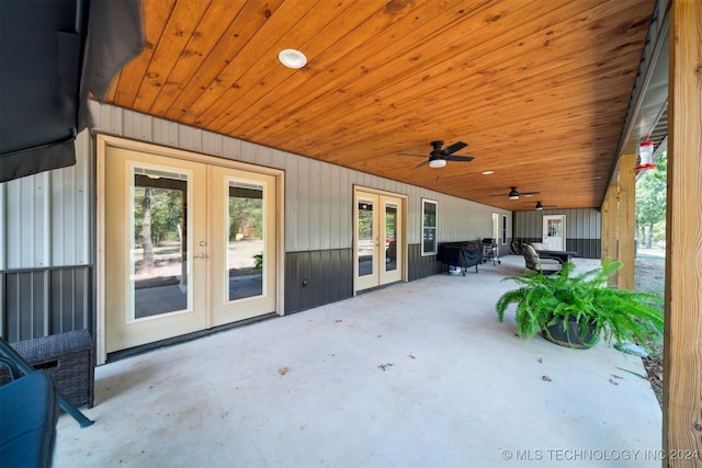 view of patio / terrace featuring ceiling fan and french doors