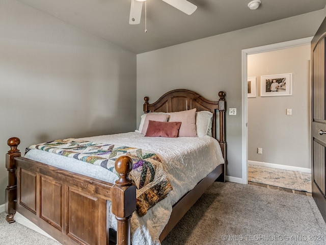 bedroom with ceiling fan and carpet floors