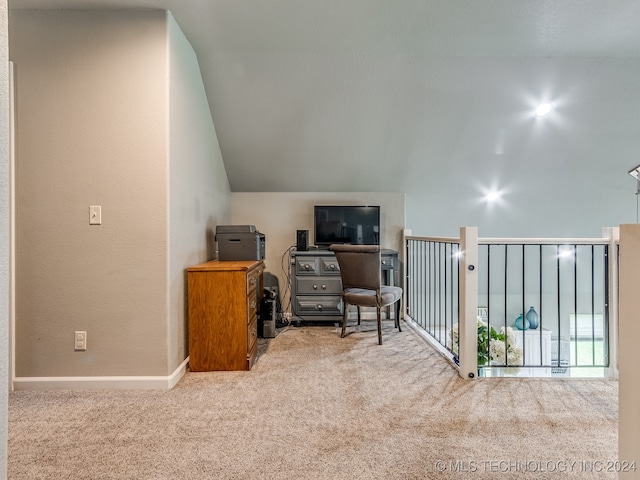 office featuring carpet and vaulted ceiling