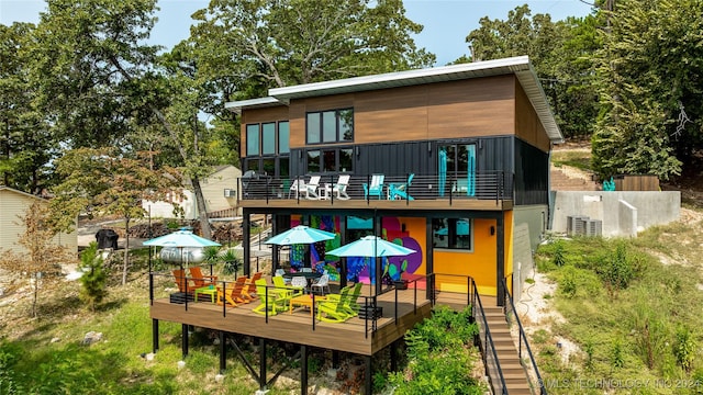 517 Private Road 91, Eucha, OK 74342 - rear view of house with a balcony, stairs, and a deck