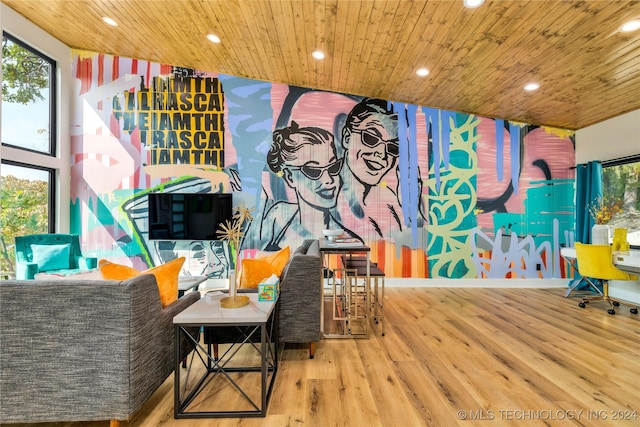 playroom with plenty of natural light, wood-type flooring, and wooden ceiling