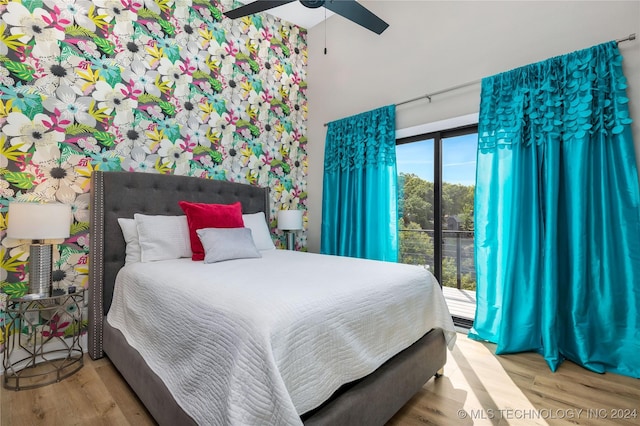 bedroom featuring ceiling fan, access to exterior, and light hardwood / wood-style floors