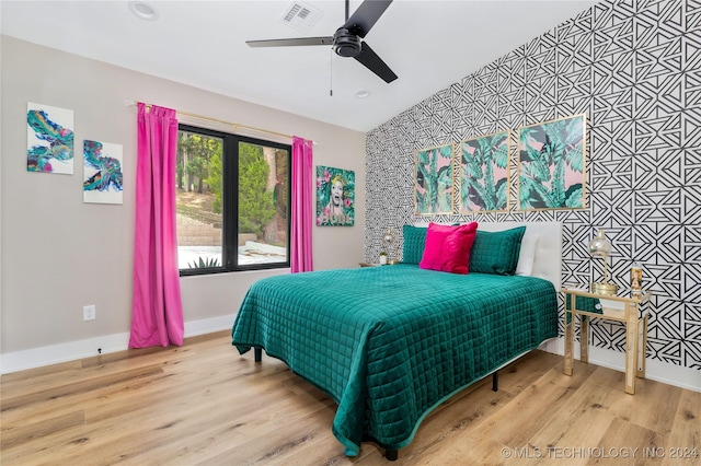 bedroom featuring ceiling fan and light wood-type flooring