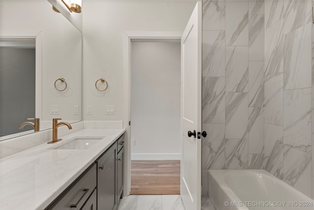 bathroom featuring vanity and hardwood / wood-style floors