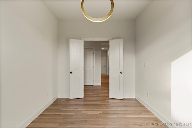 unfurnished room featuring light hardwood / wood-style flooring