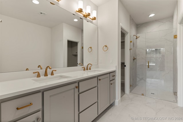 bathroom featuring vanity and a tile shower