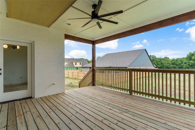 wooden terrace featuring ceiling fan