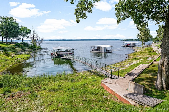 view of dock with a water view