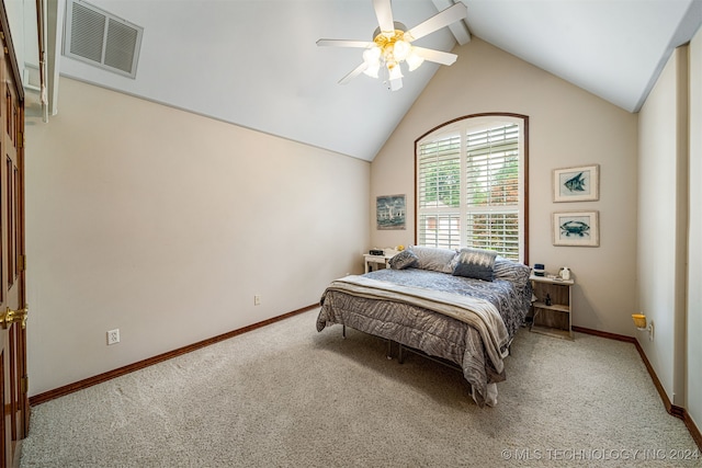 carpeted bedroom with high vaulted ceiling and ceiling fan