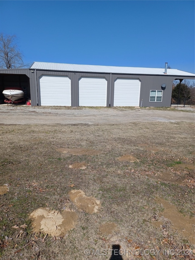 view of outbuilding featuring a garage