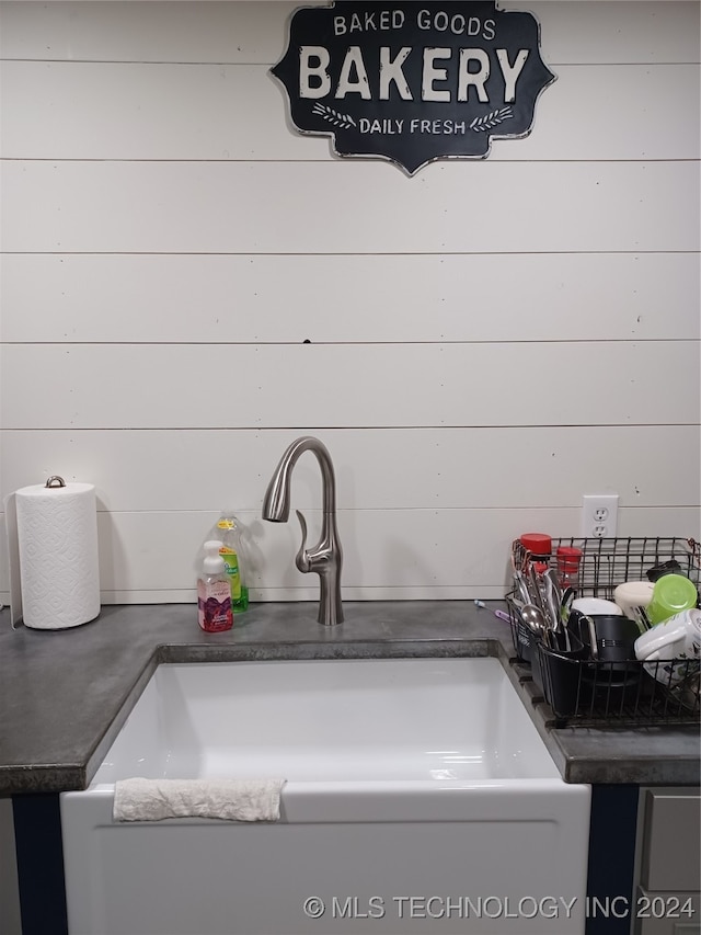 interior details with sink and wooden walls