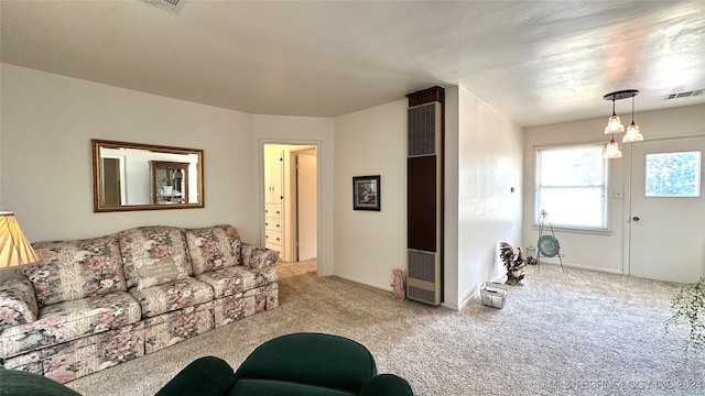 living room featuring light colored carpet