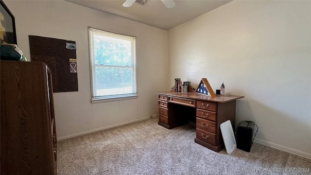 home office with ceiling fan, a wealth of natural light, and light carpet