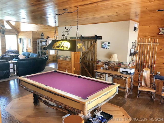 recreation room featuring billiards, wood walls, wood ceiling, hardwood / wood-style flooring, and a barn door