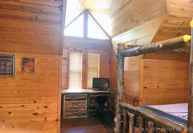 bedroom with dark wood-type flooring, wood walls, lofted ceiling, and wooden ceiling