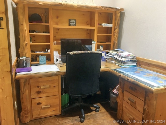 home office featuring light hardwood / wood-style floors