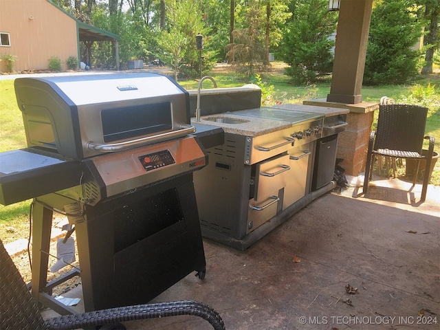 view of patio with area for grilling