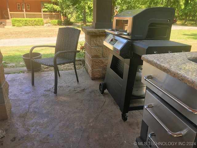 view of patio with an outdoor kitchen