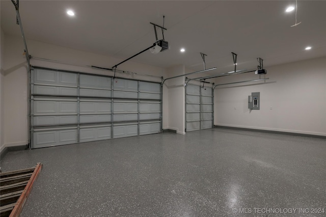 garage featuring electric panel and a garage door opener