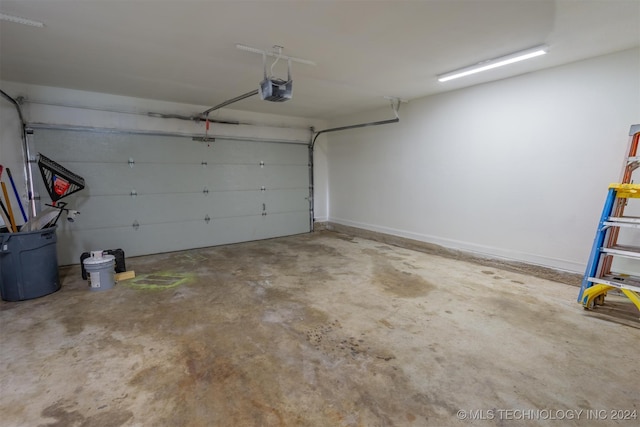 garage featuring a garage door opener